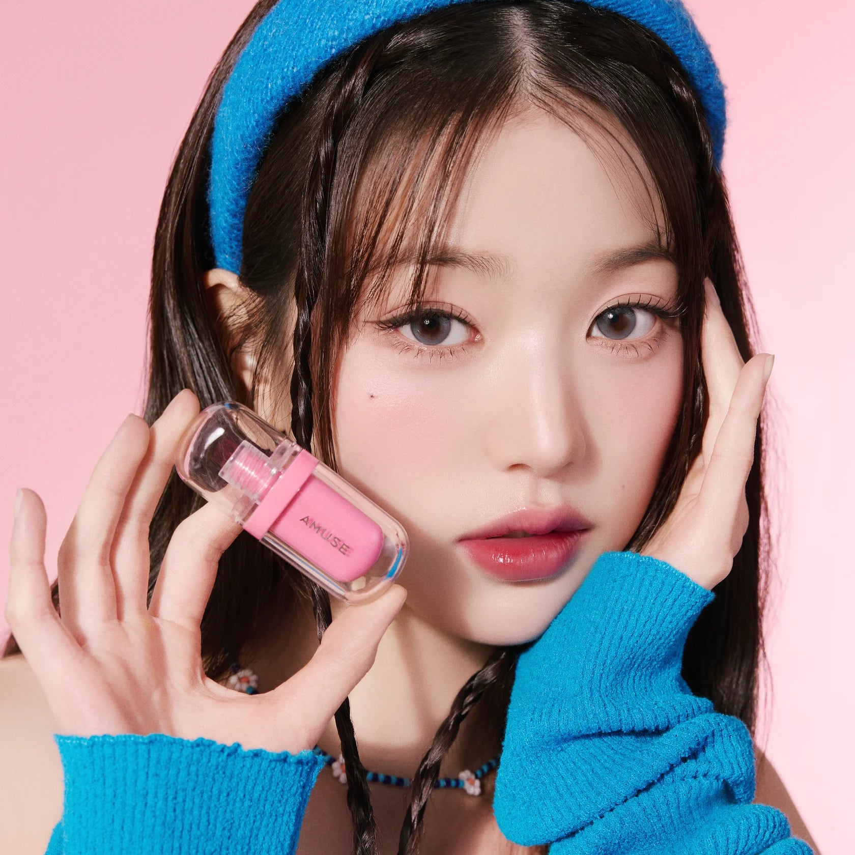 Woman holding a pink lipstick against a pink background AMUSE Jel-Fit Tint asian authentic genuine original korean skincare montreal toronto calgary canada thekshop thekshop.ca natural organic vegan cruelty-free cosmetics kbeauty vancouver free shipping clean beauty routine skin makeup kpop stayz stan fandom photocard stray kids treasure ateez atiny dix30 brossard ddo royal mount st-bruno new store
