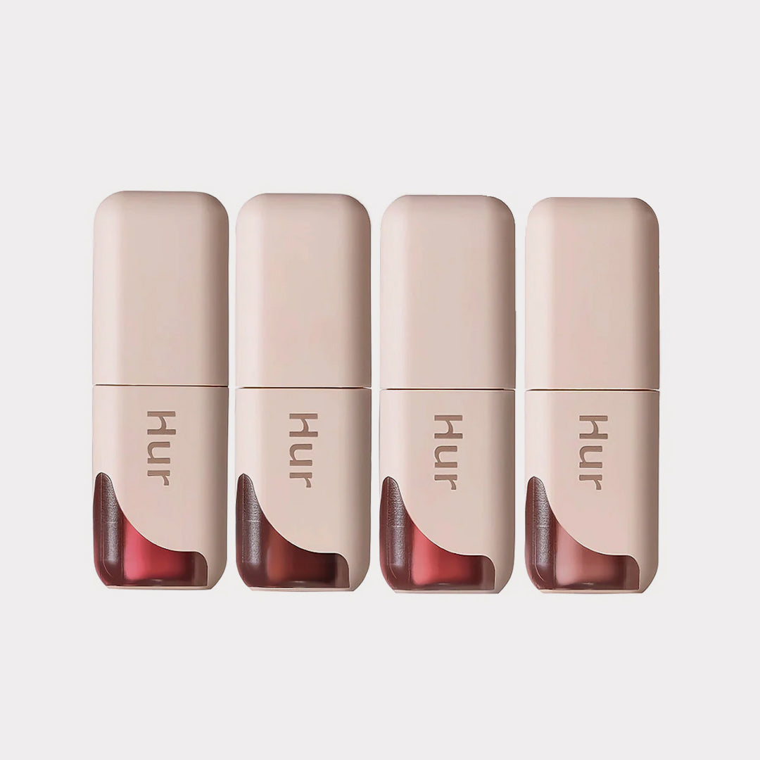 Four lip gloss containers with 'HUR' branding on a white background House of Hur Glow Ampoule Tint asian authentic genuine original korean skincare montreal toronto calgary canada thekshop thekshop.ca natural organic vegan cruelty-free cosmetics kbeauty vancouver free shipping clean beauty routine skin makeup kpop stayz stan fandom photocard stray kids treasure ateez atiny dix30 brossard ddo royal mount st-bruno new store