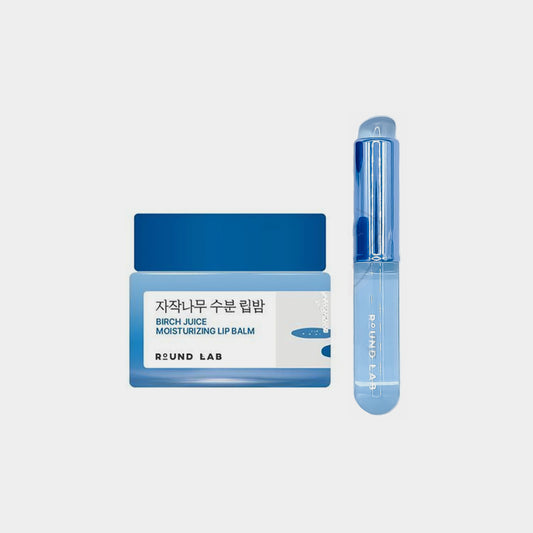 Blue lip balm container and stick on a light gray background asian authentic genuine original korean skincare montreal toronto calgary canada thekshop thekshop.ca natural organic vegan cruelty-free cosmetics kbeauty vancouver free shipping clean beauty routine skin makeup kpop stayz stan fandom photocard stray kids treasure ateez atiny dix30 brossard ddo royal mount st-bruno new store