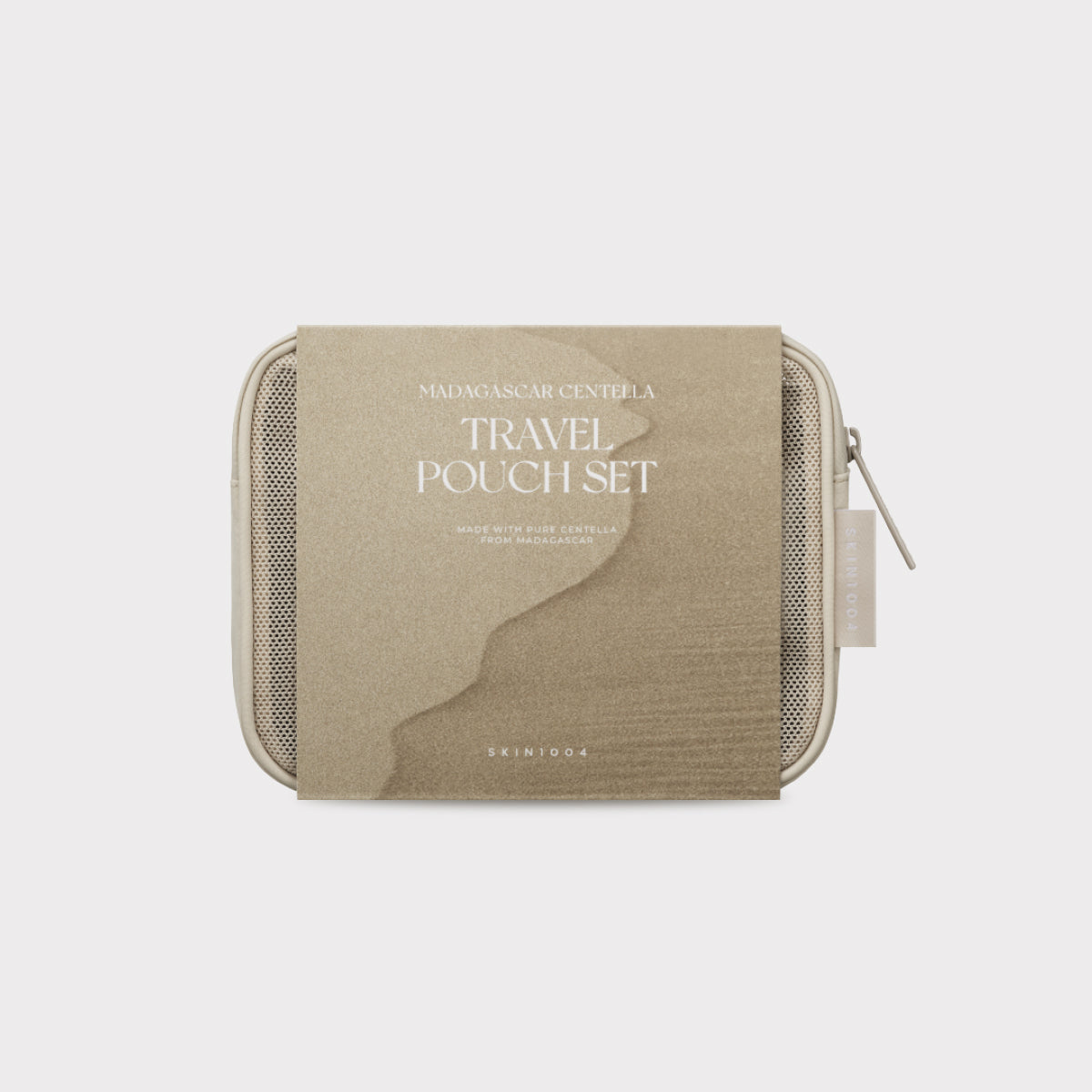 Beige travel pouch set with 'SKIN1004 MADAGASCAR CENTELLA' branding on a light gray background Collection of Centella skincare products on a light background SKIN1004 Madagascar Centella Travel Pouch Set asian authentic genuine original korean skincare montreal toronto calgary canada thekshop thekshop.ca natural organic vegan cruelty-free cosmetics kbeauty vancouver free shipping clean beauty routine skin makeup kpop stayz stan fandom photocard stray kids treasure ateez atiny dix30 brossard ddo royal mount 