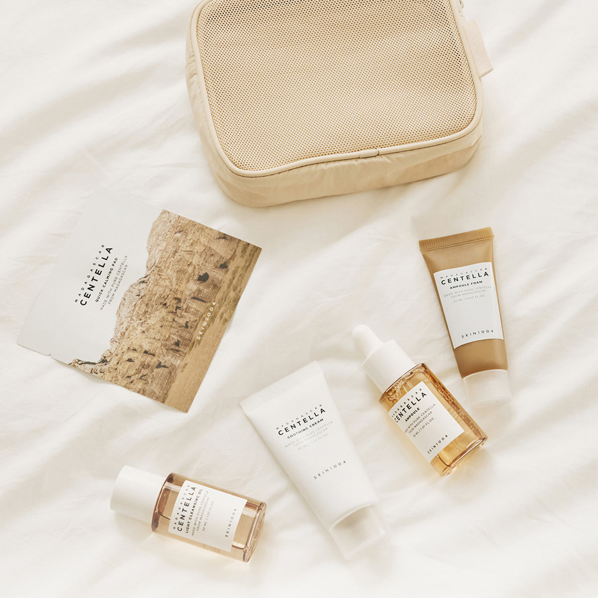 Collection of Centella skincare products on a light background SKIN1004 Madagascar Centella Travel Pouch Set asian authentic genuine original korean skincare montreal toronto calgary canada thekshop thekshop.ca natural organic vegan cruelty-free cosmetics kbeauty vancouver free shipping clean beauty routine skin makeup kpop stayz stan fandom photocard stray kids treasure ateez atiny dix30 brossard ddo royal mount st-bruno new store downtown eaton centre soins de la peau coréens, cosmétiques coréens
