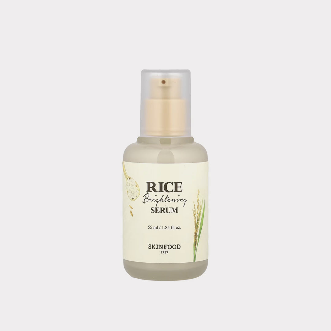 Skinfood Rice Brightening Serum bottle on a light beige background asian authentic genuine original korean skincare montreal toronto calgary canada thekshop thekshop.ca natural organic vegan cruelty-free cosmetics kbeauty vancouver free shipping clean beauty routine skin makeup kpop stayz stan fandom photocard stray kids treasure ateez atiny dix30 brossard ddo royal mount st-bruno new store