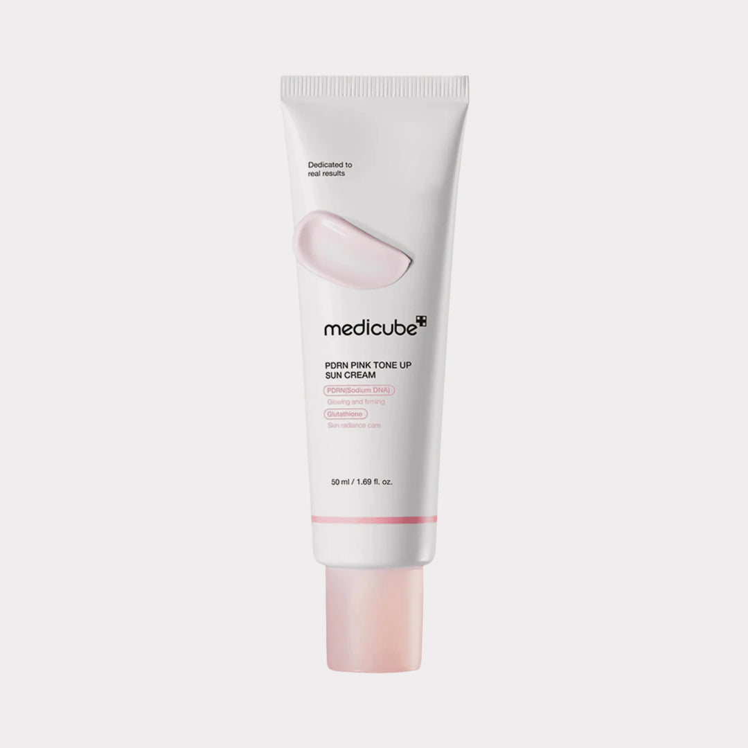 Medicube pink tone-up sun cream tube on a white background medicube PDRN Pink Tone Up Sun Cream asian authentic genuine original korean skincare montreal toronto calgary canada thekshop thekshop.ca natural organic vegan cruelty-free cosmetics kbeauty vancouver free shipping clean beauty routine skin makeup kpop stayz stan fandom photocard stray kids treasure ateez atiny dix30 brossard ddo royal mount st-bruno new store